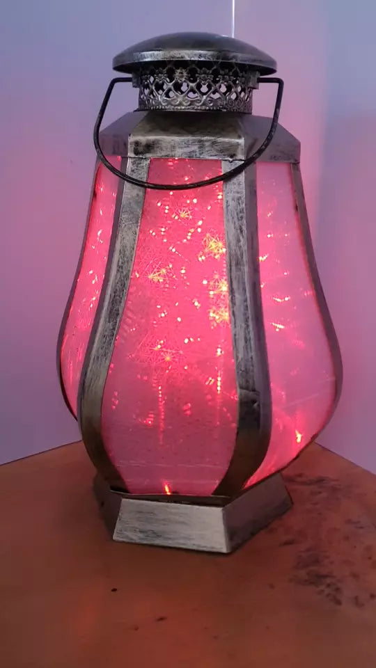 Rotierende LED-Laterne mit 3D-Effekt von Luxform - Farbwechsel in Bunt
